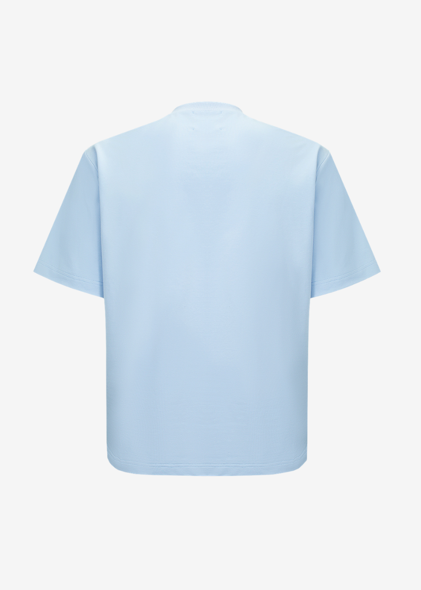A light blue short-sleeve crewneck t-shirt shown from the back, displayed on a clean, solid off-white background.