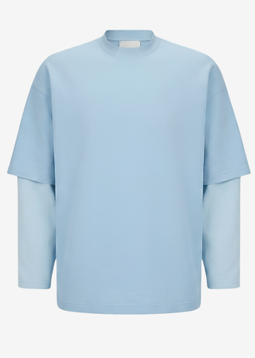 A light blue long-sleeve t-shirt with a layered, double-layered sleeve design, shown against a plain light gray background.