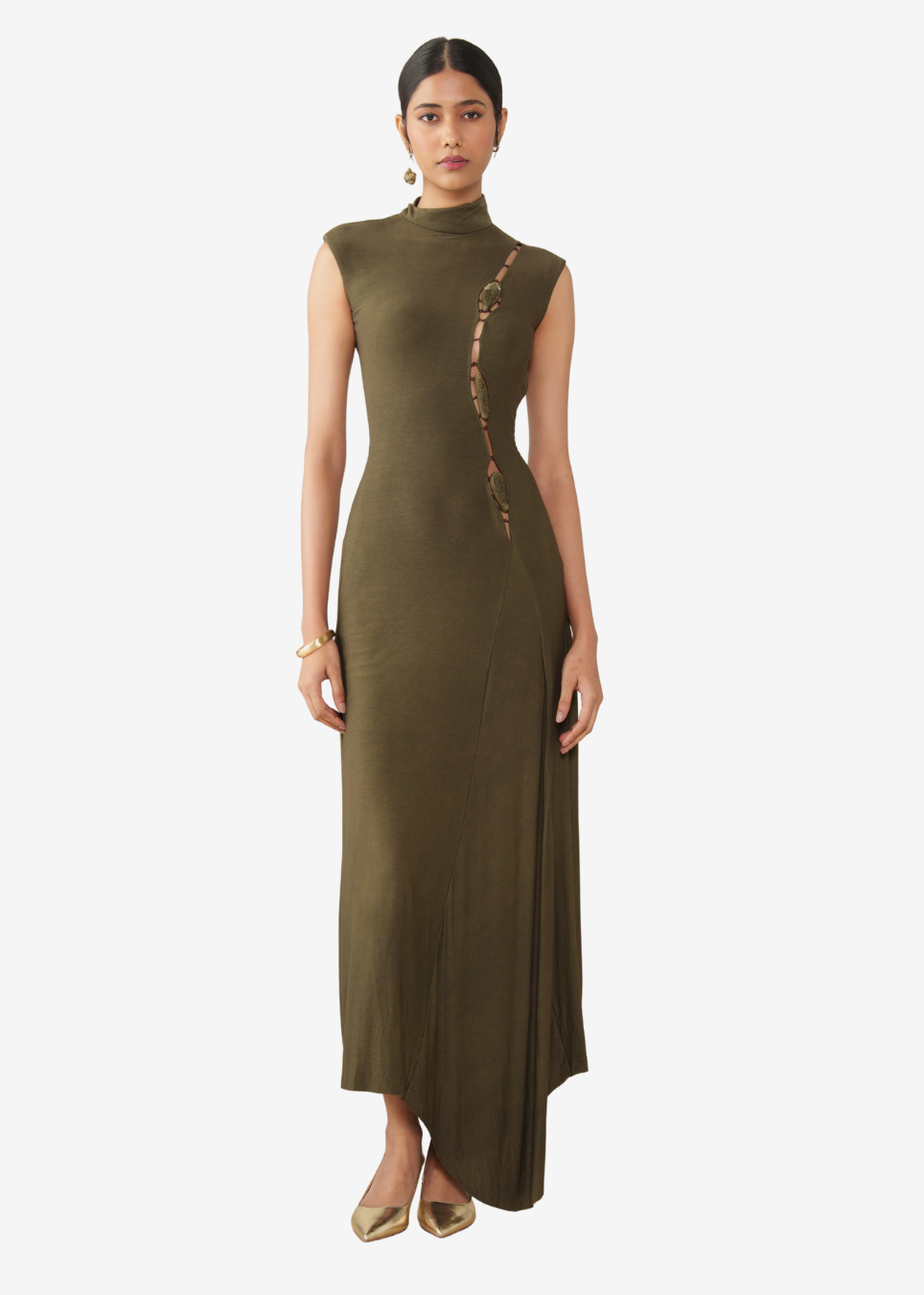 A woman modeling a sleeveless, high-neck, floor-length olive green dress with a vertical embroidered detail on the side, set against a plain light gray background.