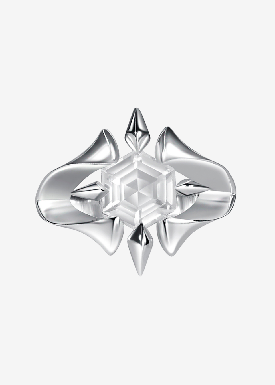 silver ring with quartz stone at the center on a white background