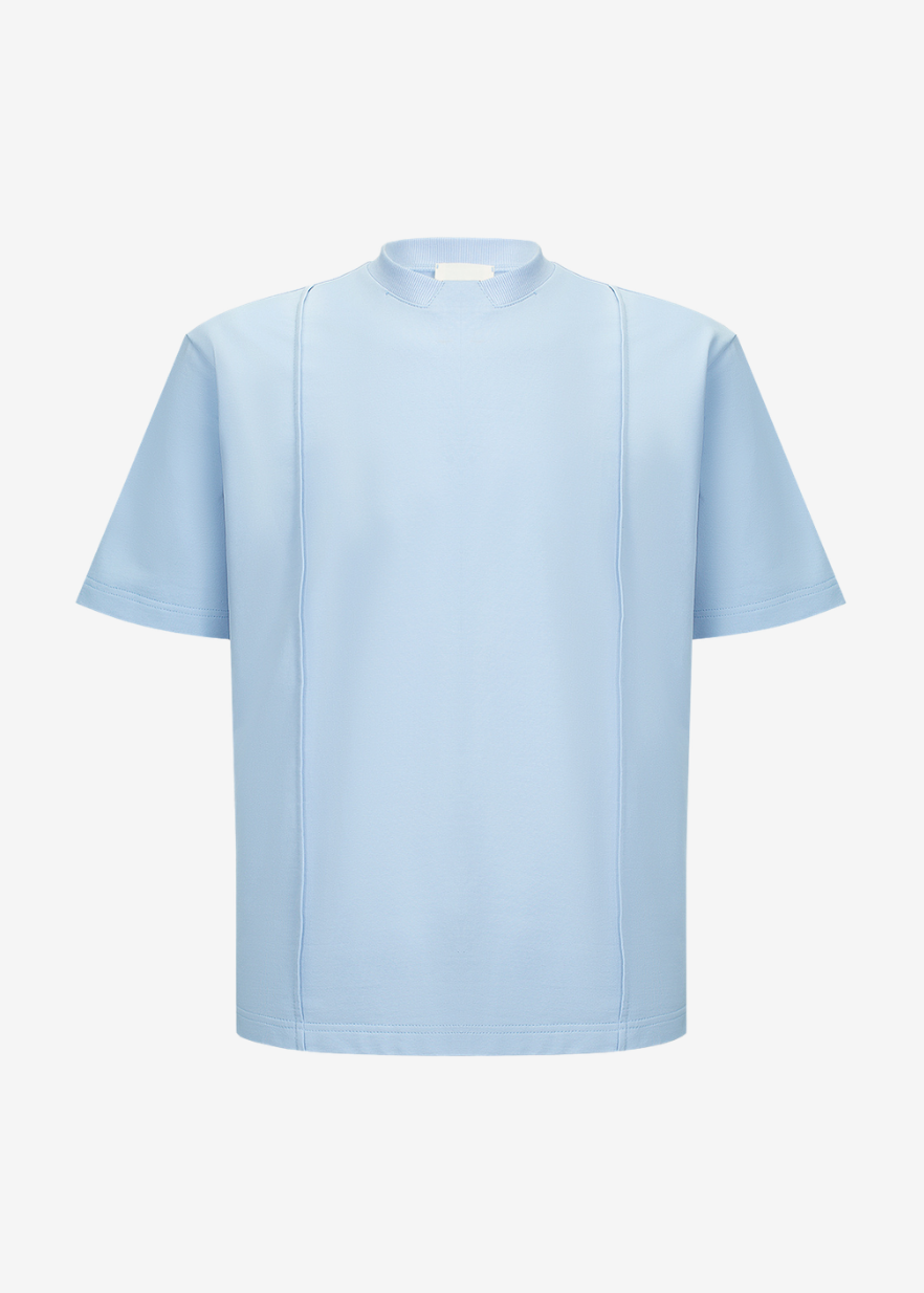 A light blue short-sleeve t-shirt with a mock neck and subtle vertical seam details on the front, displayed against a clean off-white background.