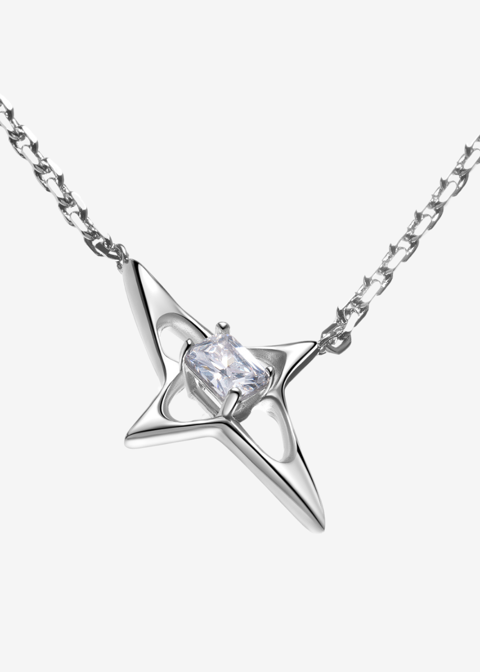 A silver-toned necklace featuring a star-shaped pendant with a clear rectangular gemstone at its center, suspended from a delicate chain against a light gray background.