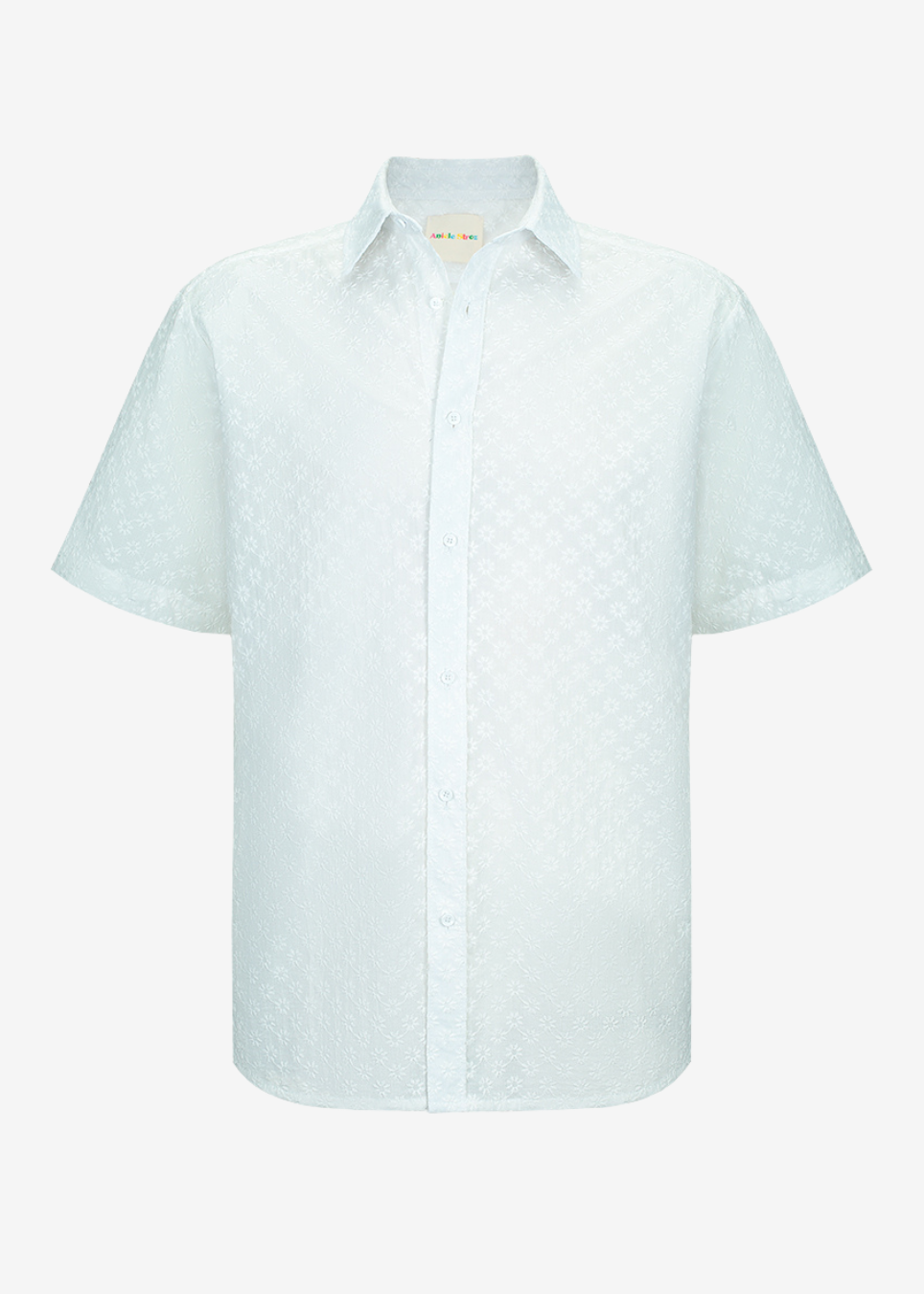 A short-sleeve button-up shirt featuring a subtle repeating geometric jacquard pattern across the fabric. The shirt is presented on a clean, solid off-white background.