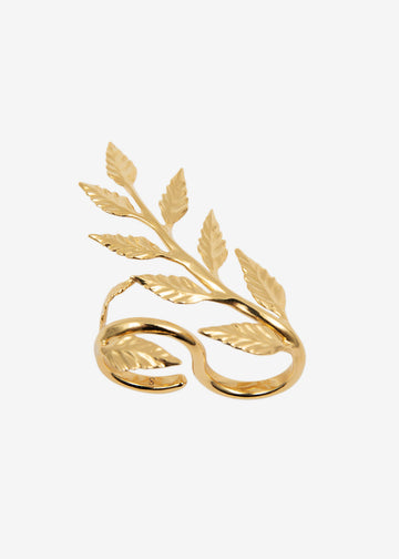 Gold leaf-shaped ring on a white background