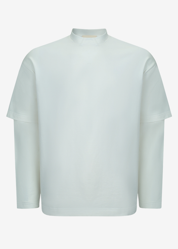 A pale mint green long-sleeve mock neck shirt displayed on a clean, solid off-white background.